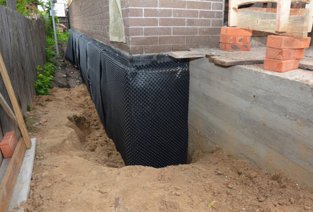 Happy homeowners after waterproofing job in Wallingford